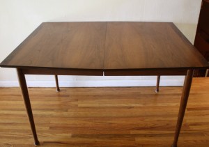mcm surfboard dining table with hidden leaf 1