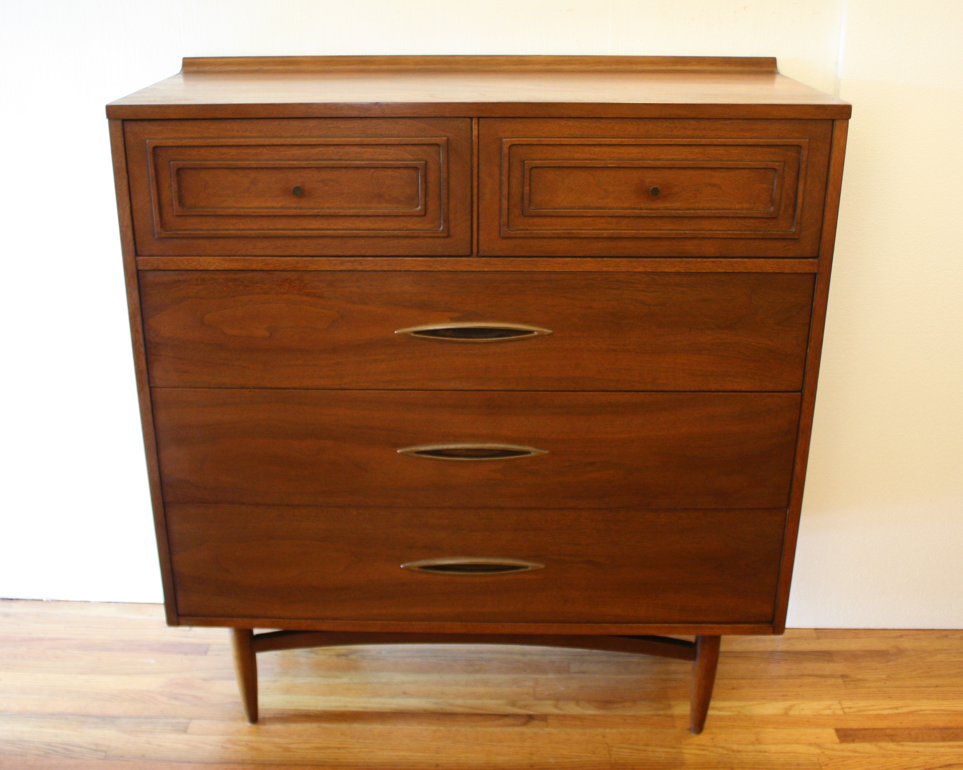 mcm tall dresser with sculpted handles 1