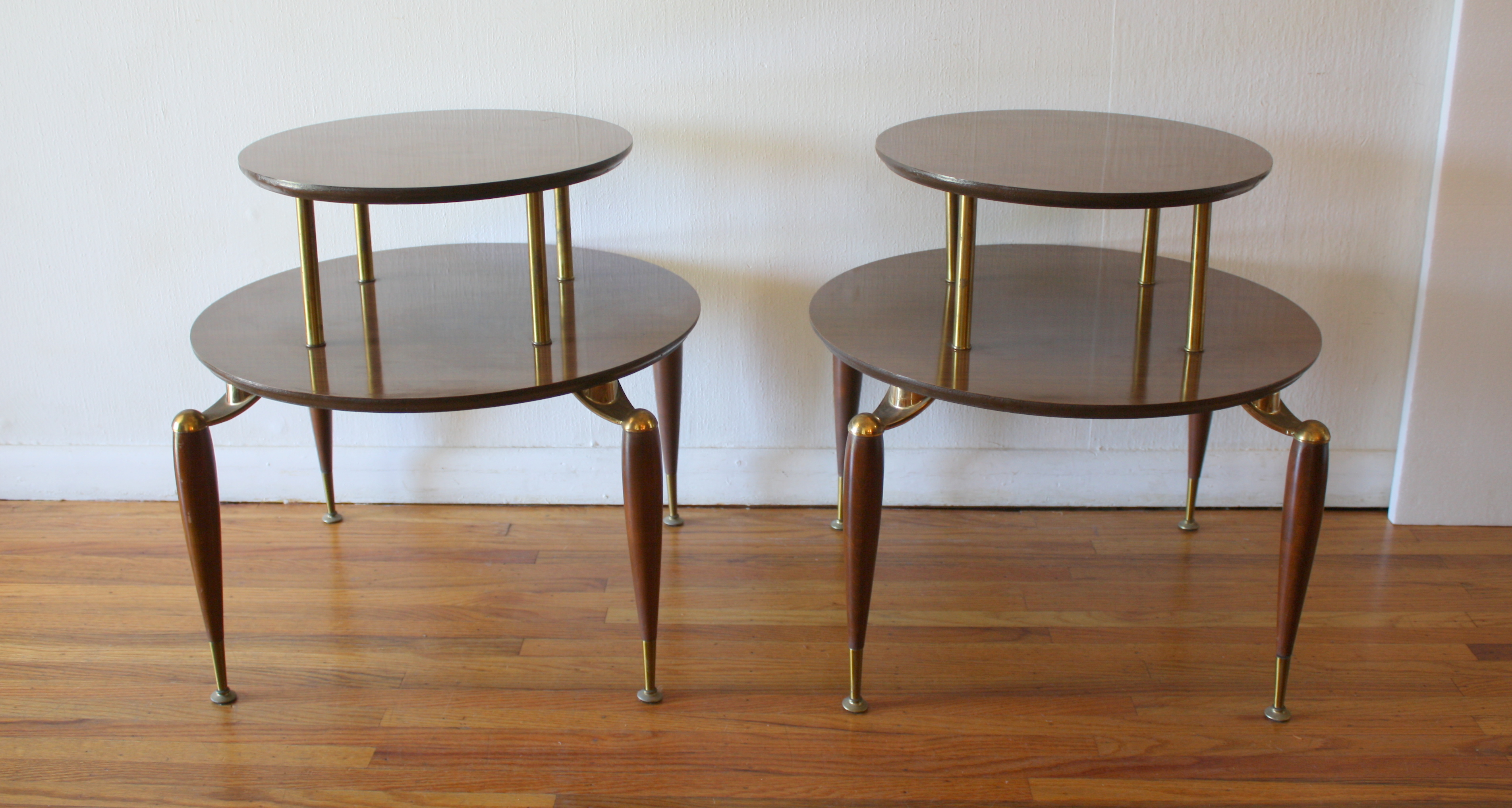 mcm pair of round 2 tiered side tables 2.JPG