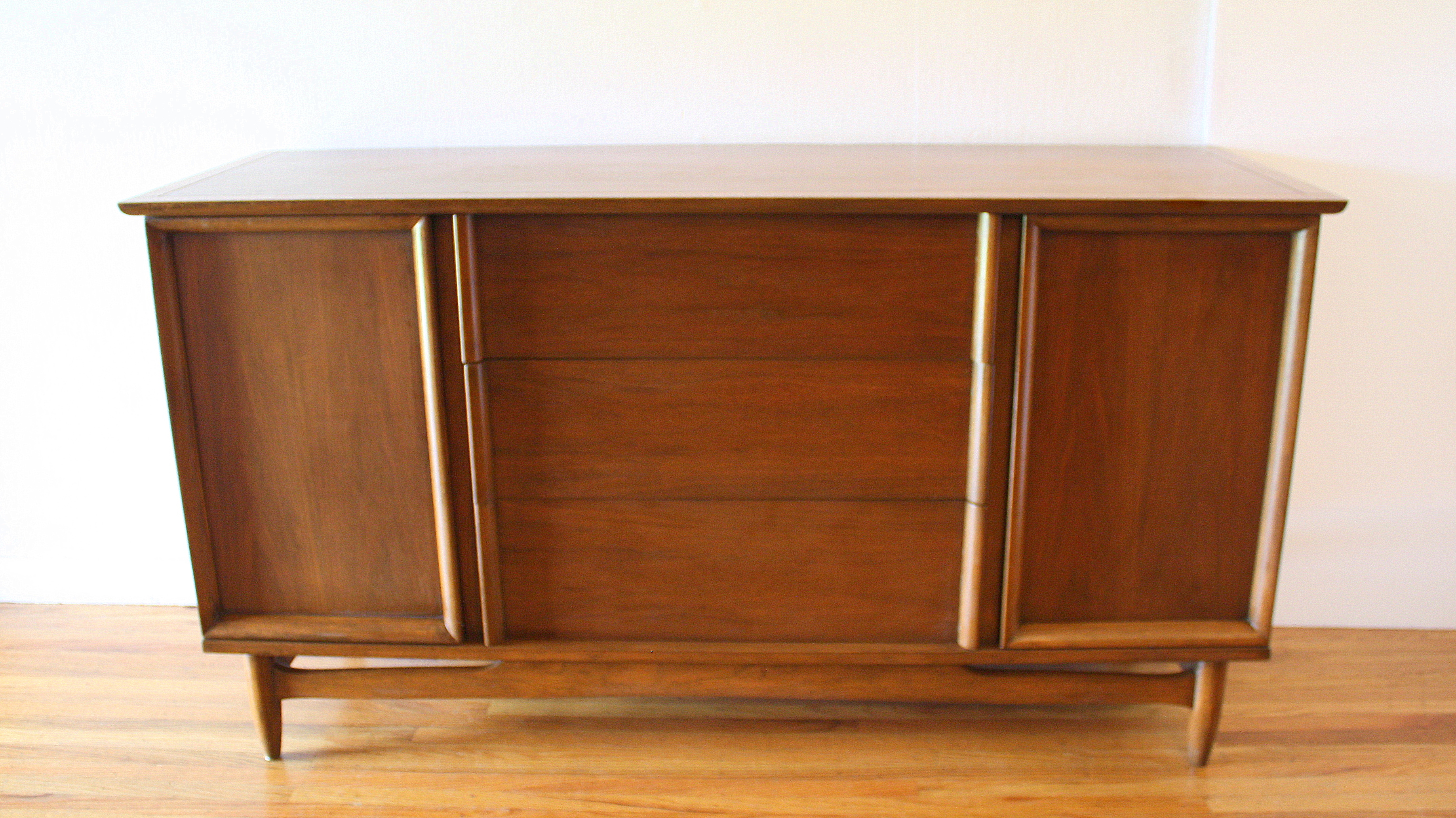 mcm credenza arched base streamlined design 1