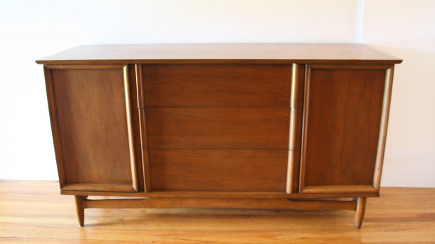mcm credenza arched base streamlined design 1