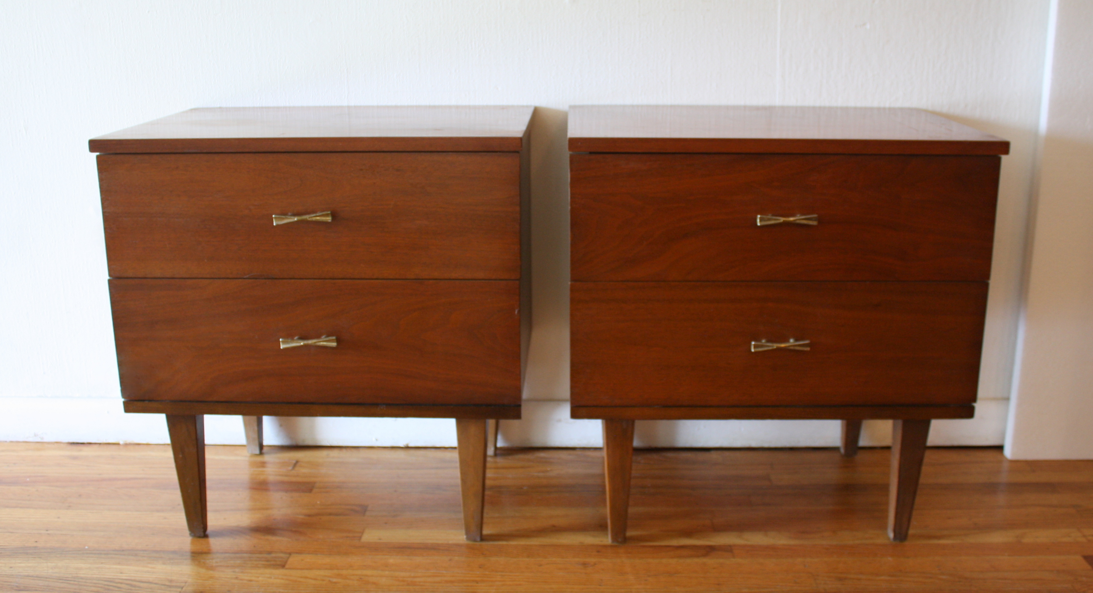 mcm pair of bow tie nightstands 1