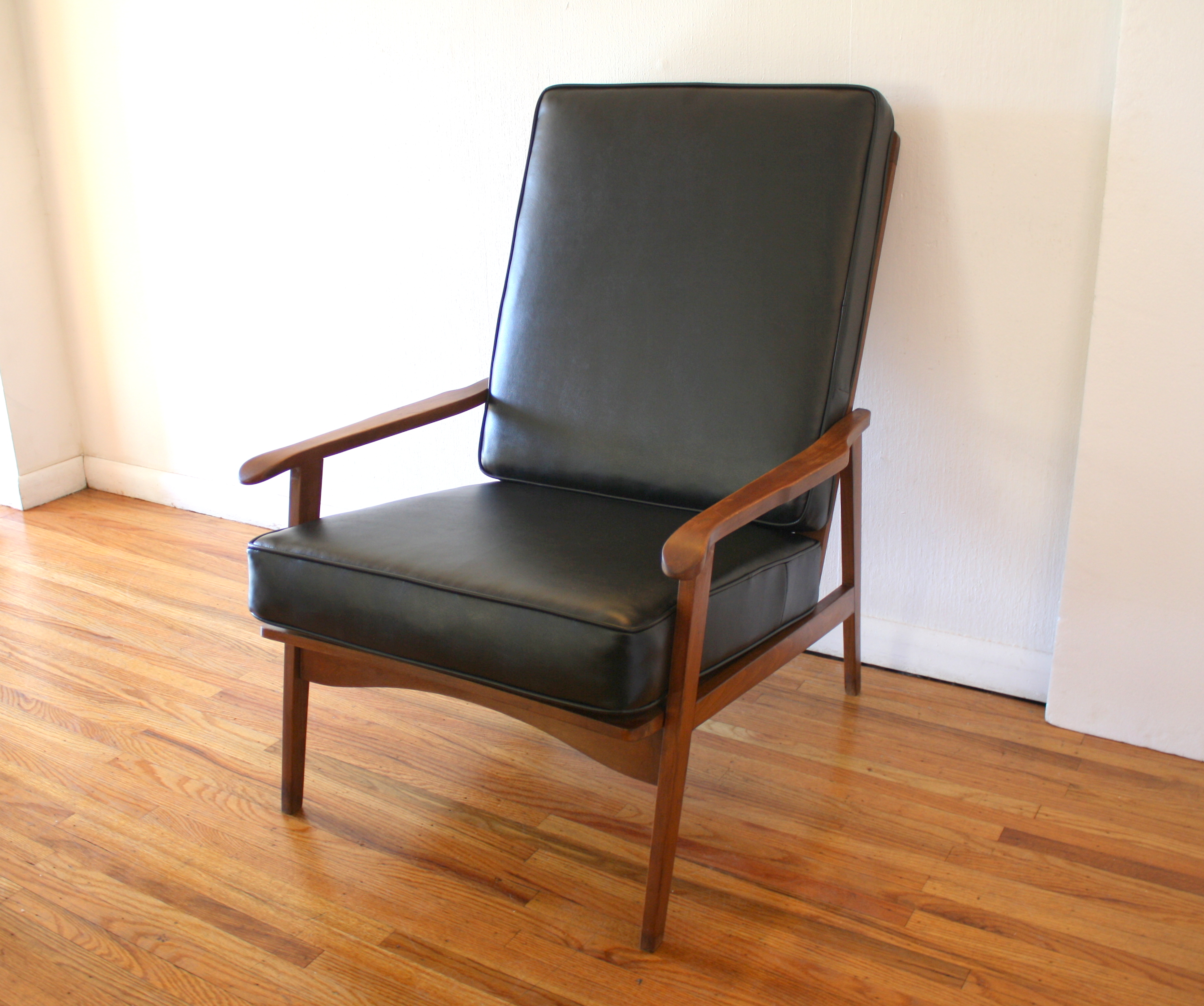 mcm arm lounge chair with black naugahyde 1.JPG