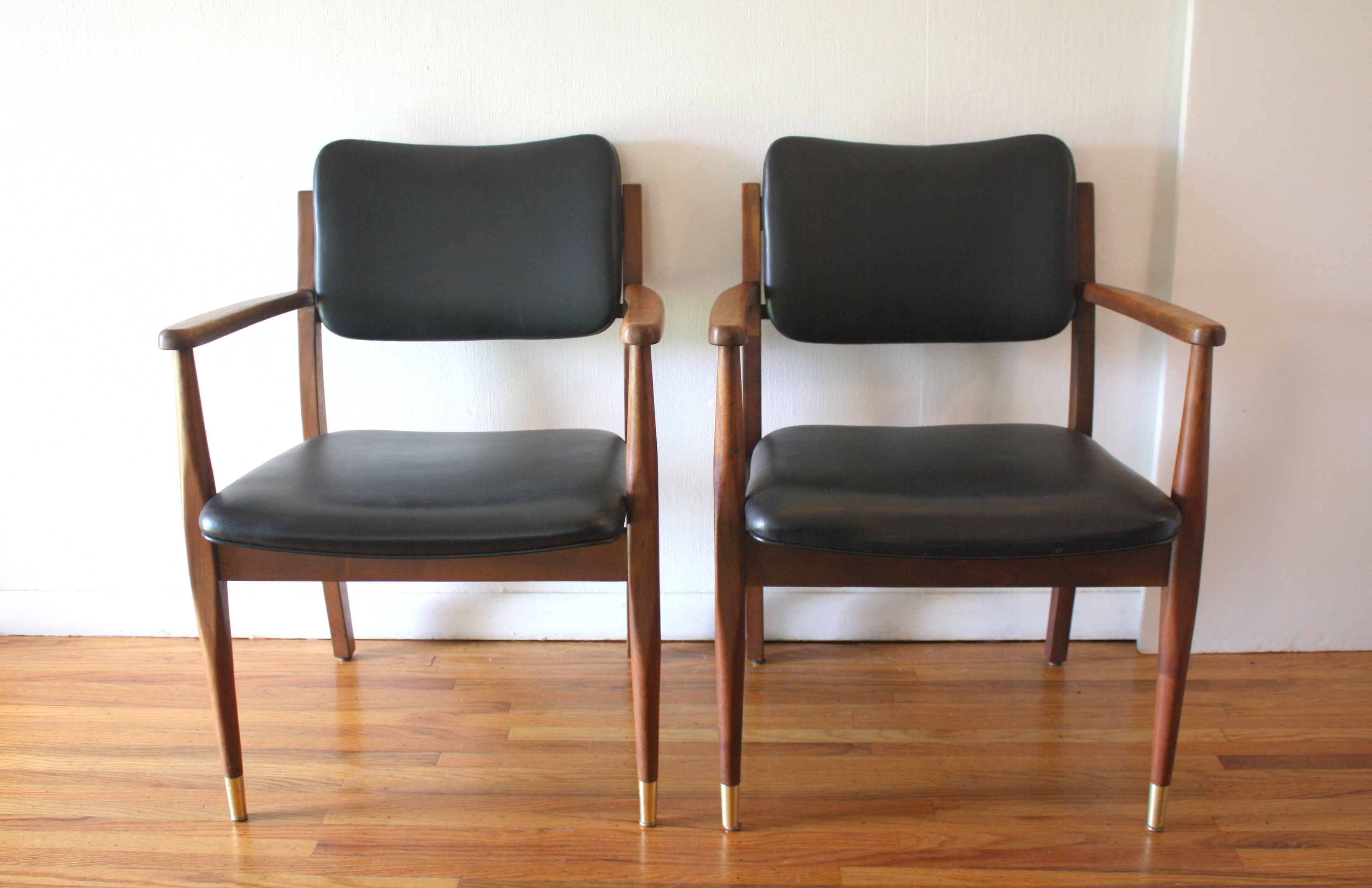 mcm pair of black naugahyde Gregson chairs 1