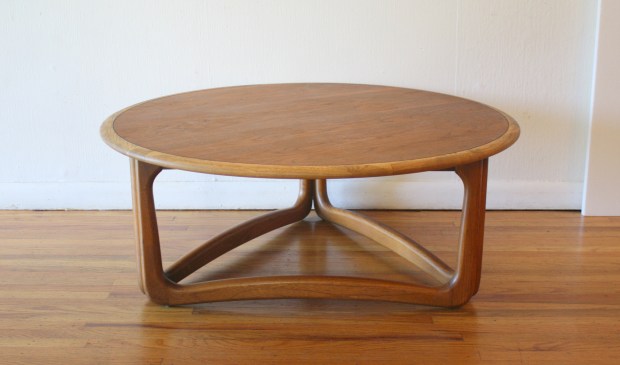 Lane round coffee table sculpted base 1.JPG